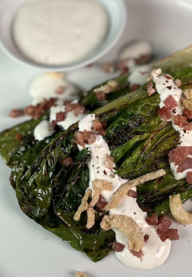 grilled romaine with dressing, pancetta and French fried onions