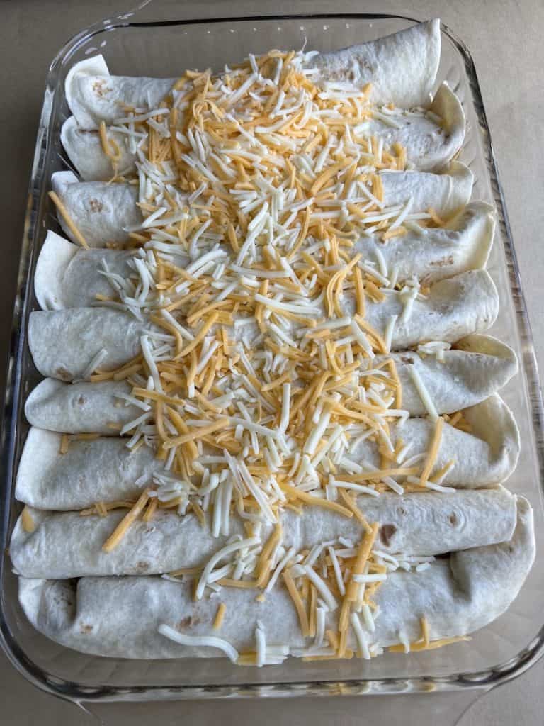 enchiladas with shredded cheese
