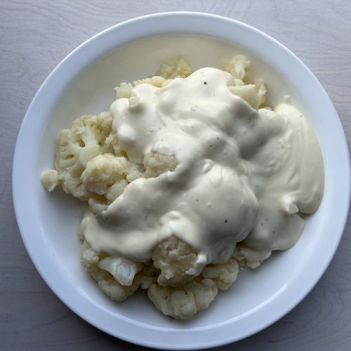 simple creamed cauliflower in a white bowl