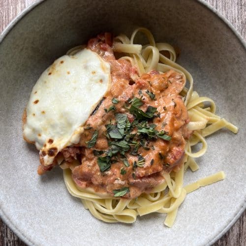 creamy tomato sauce on fettuccini with mozzarella