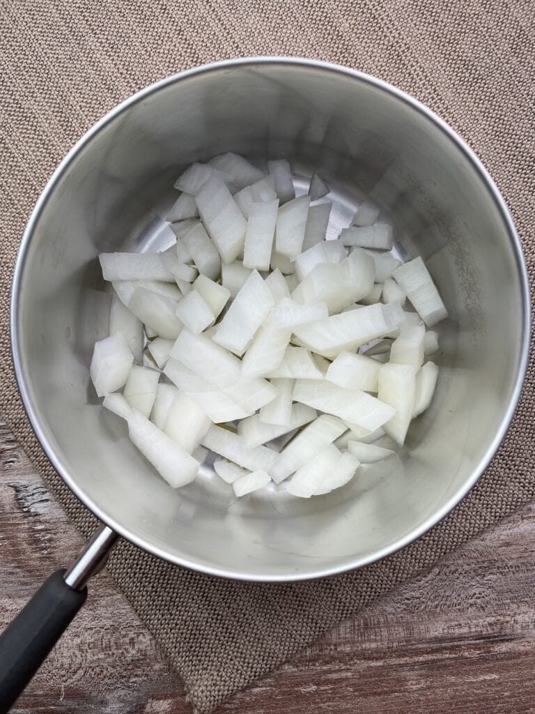 raw onions in a saucepan