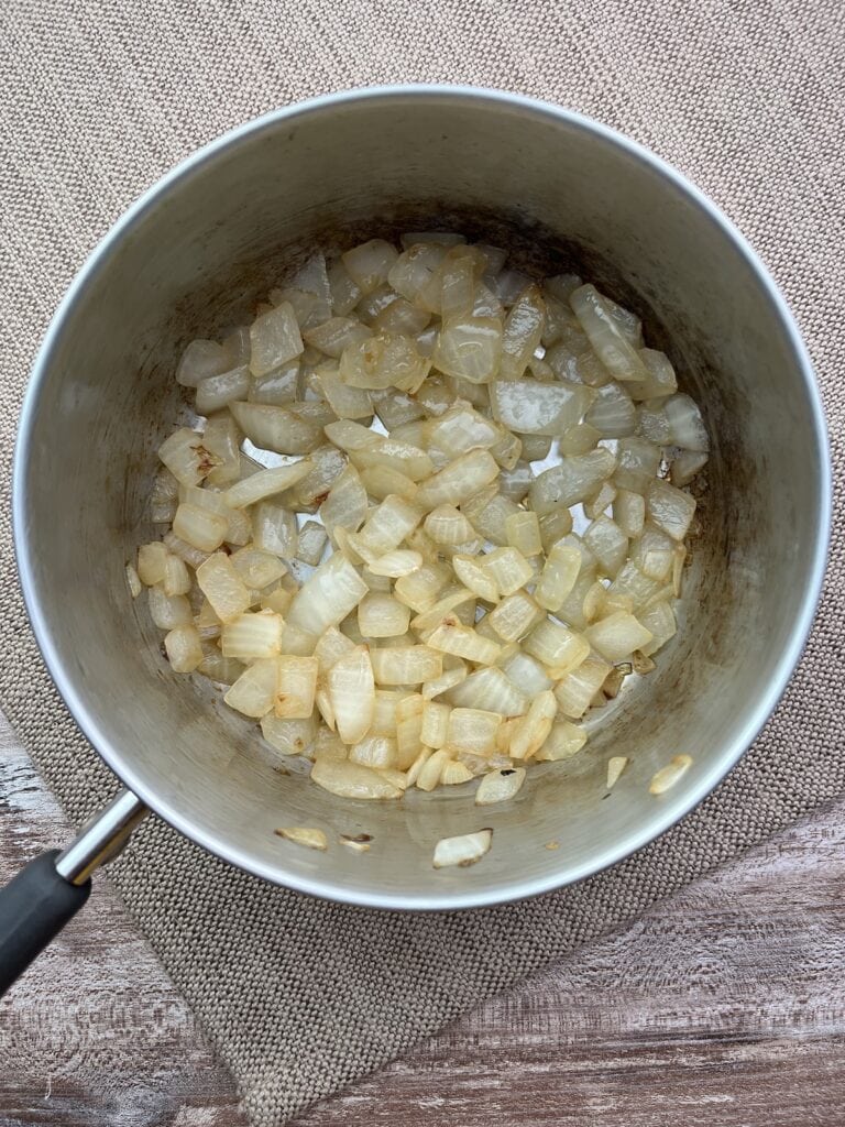 cooked onions in a saucepan