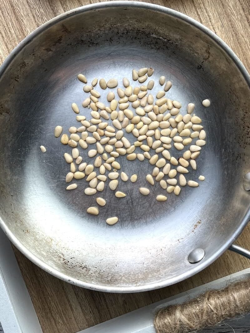 pine nuts in a small pan