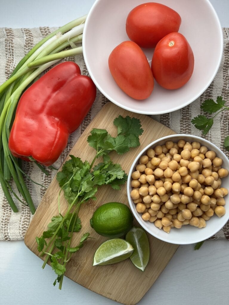 red pepper, green onions, cilantro, limes, chickpeas and Roma tomatoes