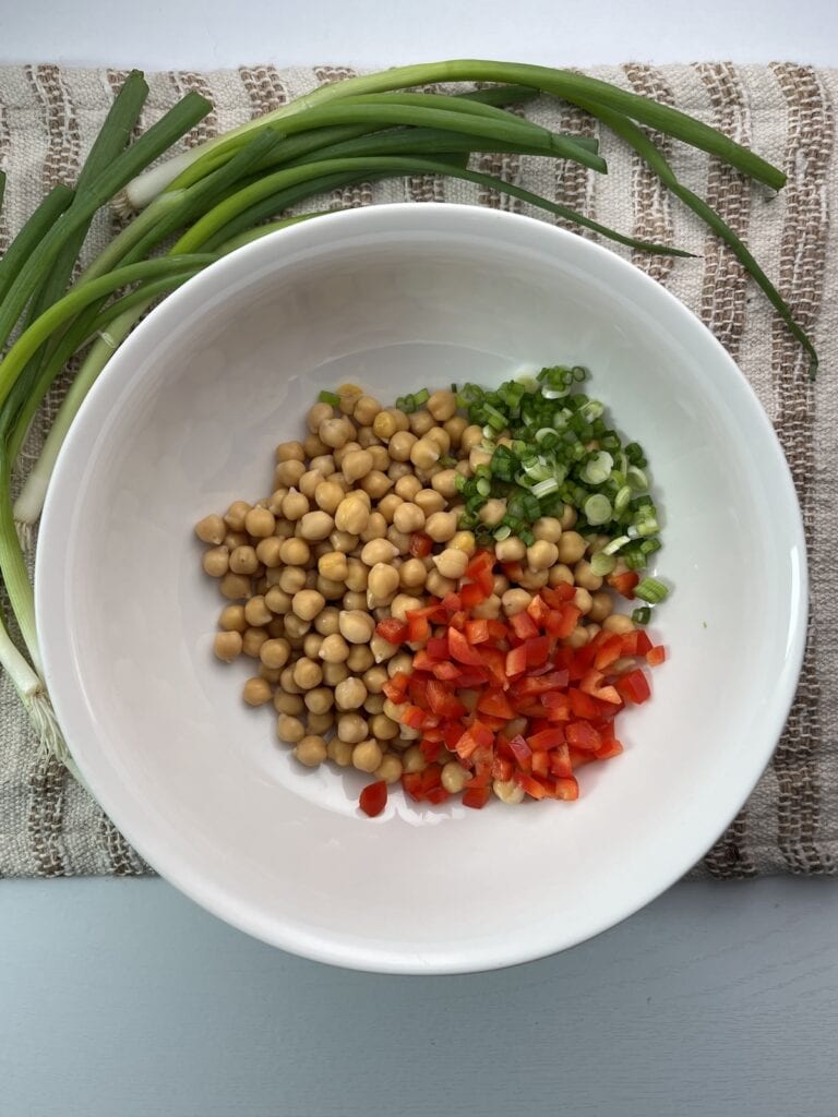 chickpeas, onions, and peppers in a bowl