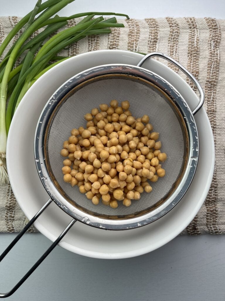chickpeas in a metal strainer