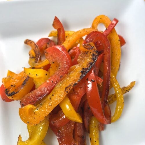 sauteed bell peppers with lemon pepper seasoning on a plate
