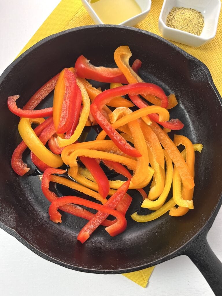 sliced bell peppers in skillet