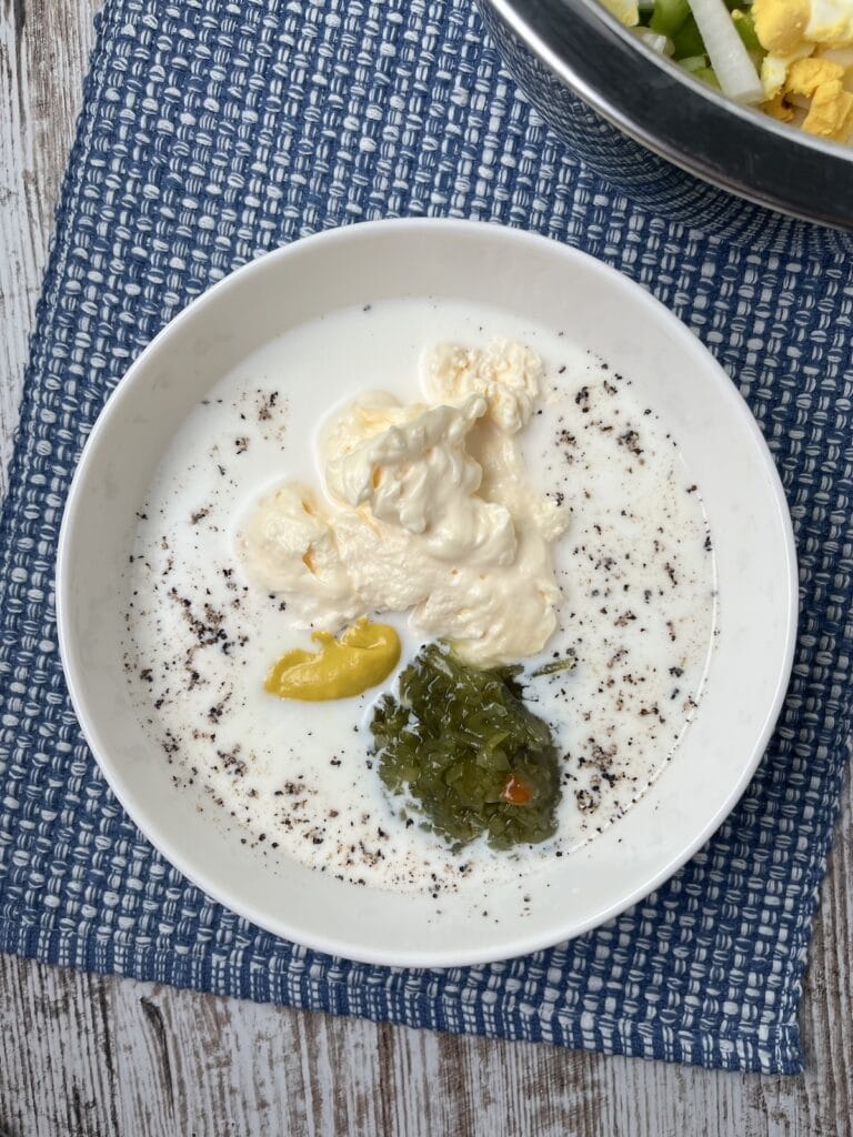 mayo, milk, mustard, relish, salt, pepper, sugar in a bowl