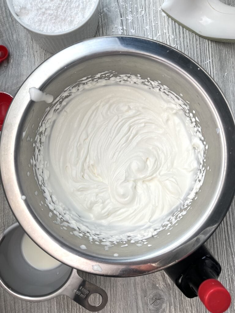 final whipped cream in a metal bowl
