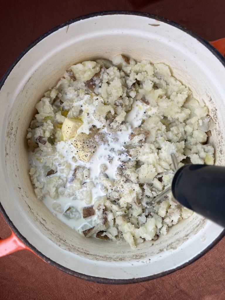 partially mashed potatoes with cream, butter, salt, and pepper